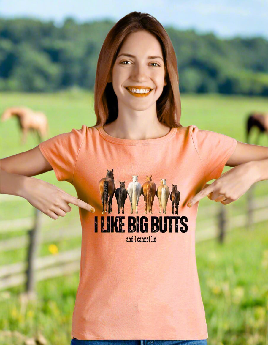 Woman wearing a shirt pointing to the graphic of 6 horse butts