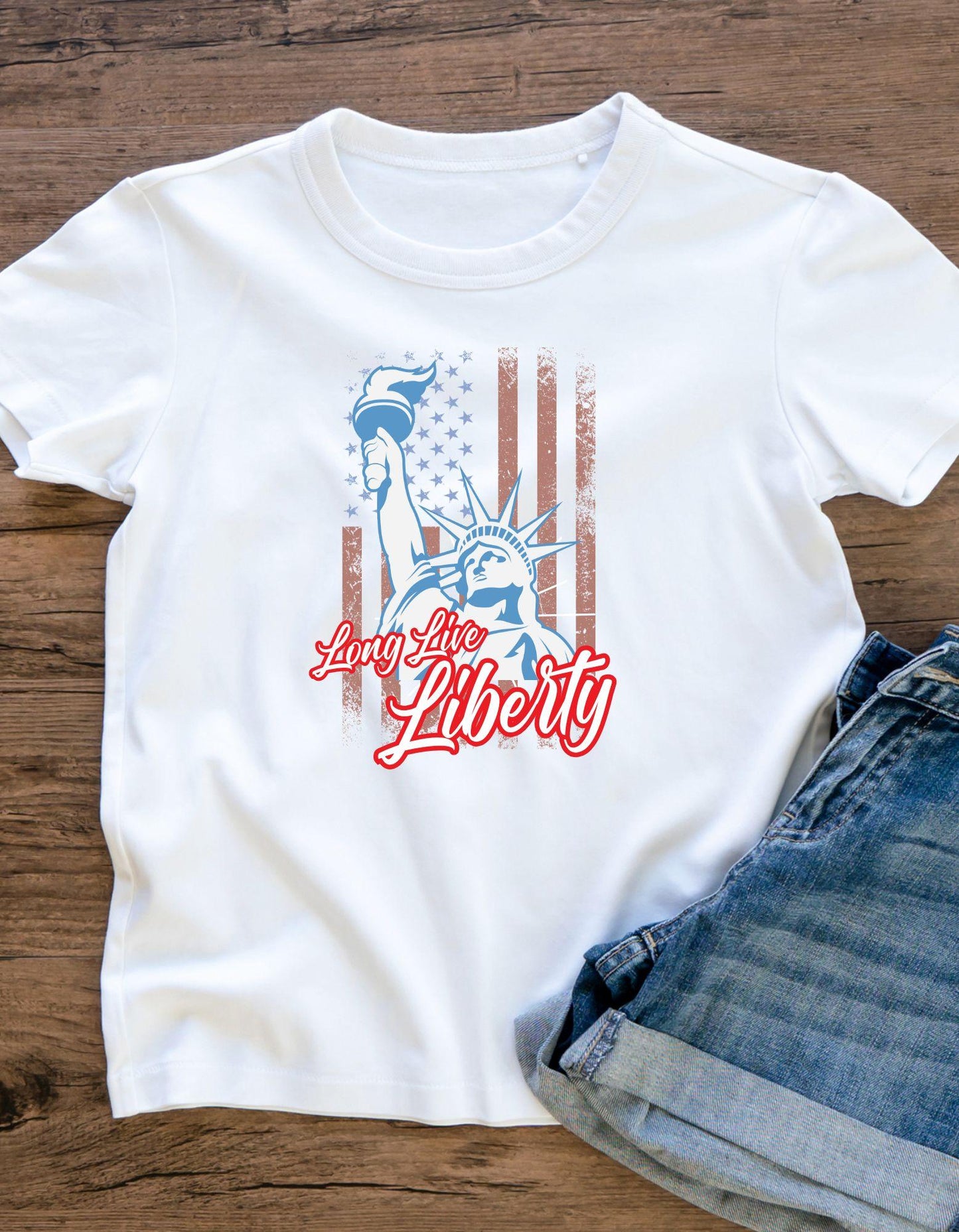 White t-shirt with 'Long Live Liberty' design on a wooden surface