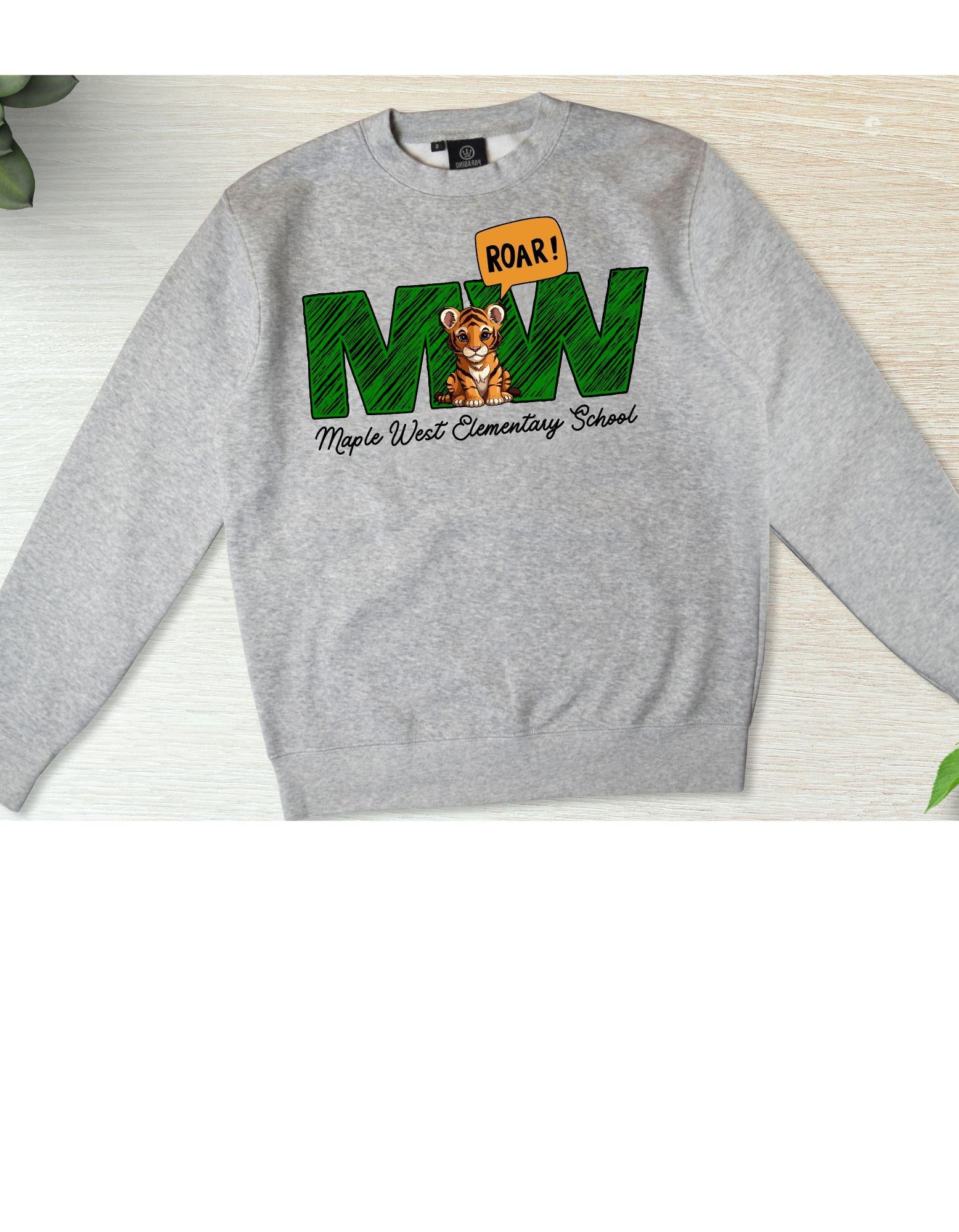 Gray sweatshirt with 'Maple West Elementary School' logo on a light wooden surface
