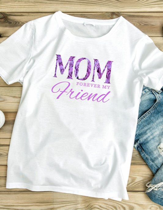 White t-shirt with 'Mom Forever My Friend' text on a wooden surface