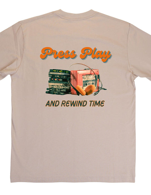 Beige t-shirt with vintage record player graphic and text 'Press Play and Rewind Time' on a beige background