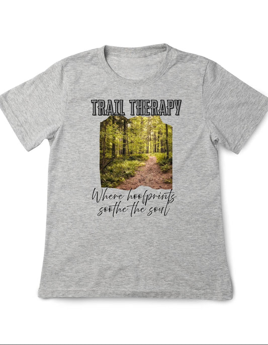 Gray t-shirt with a forest graphic and text on a white background