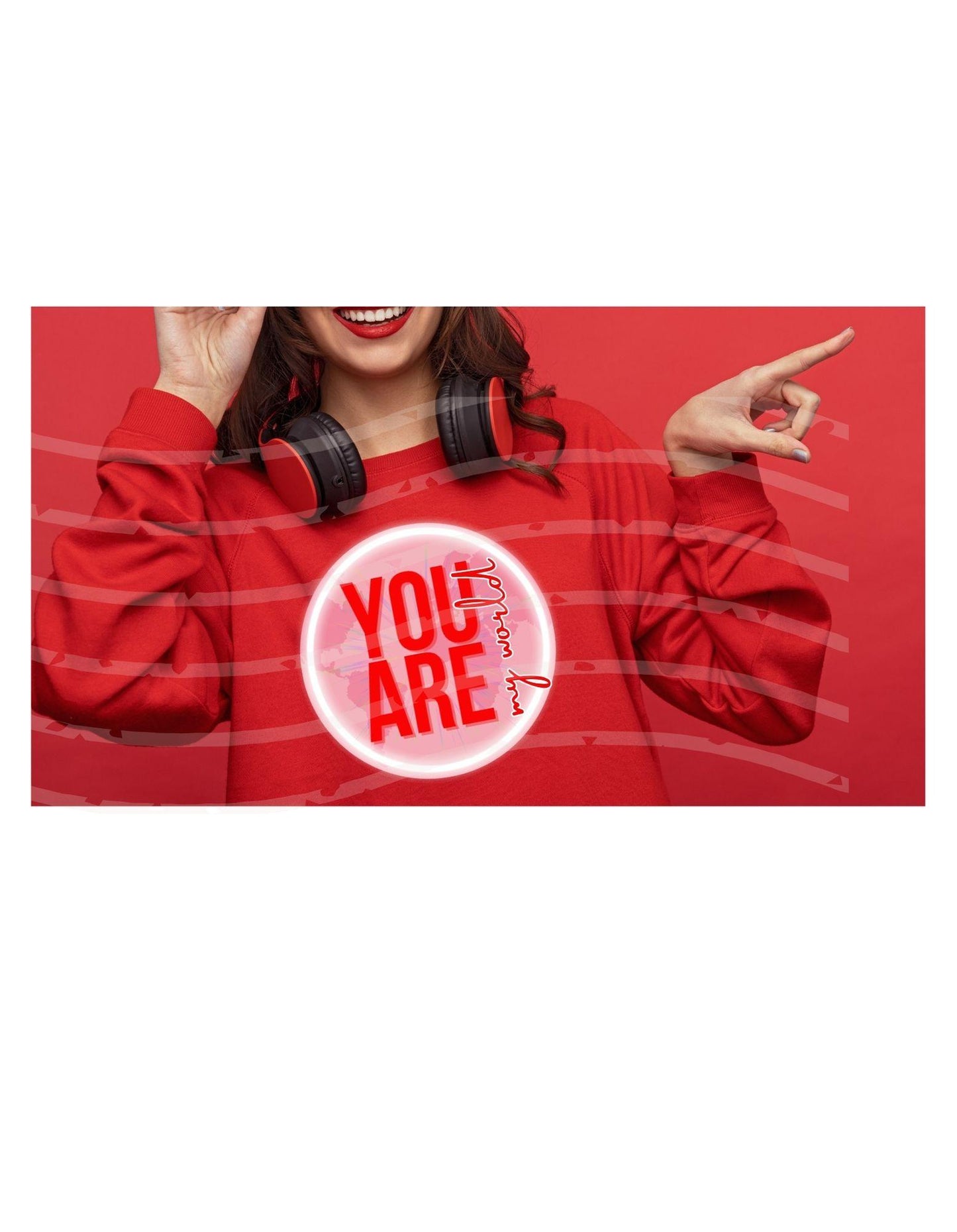 Person wearing a red sweatshirt with 'YOU ARE' printed on it, against a red background